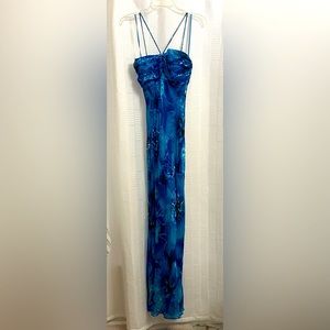 Size 4  deep aqua silk long length dress. Never worn.